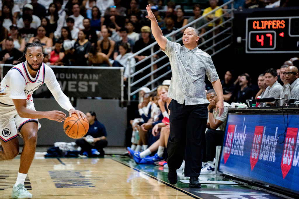 LA Clippers head coach Tyronn Lue talks during the first half of a preseason NBA basketball game against Golden State Warriors, Sunday, Oct. 4, 2026 in Honolulu. (AP Photo/Mengshin Lin)