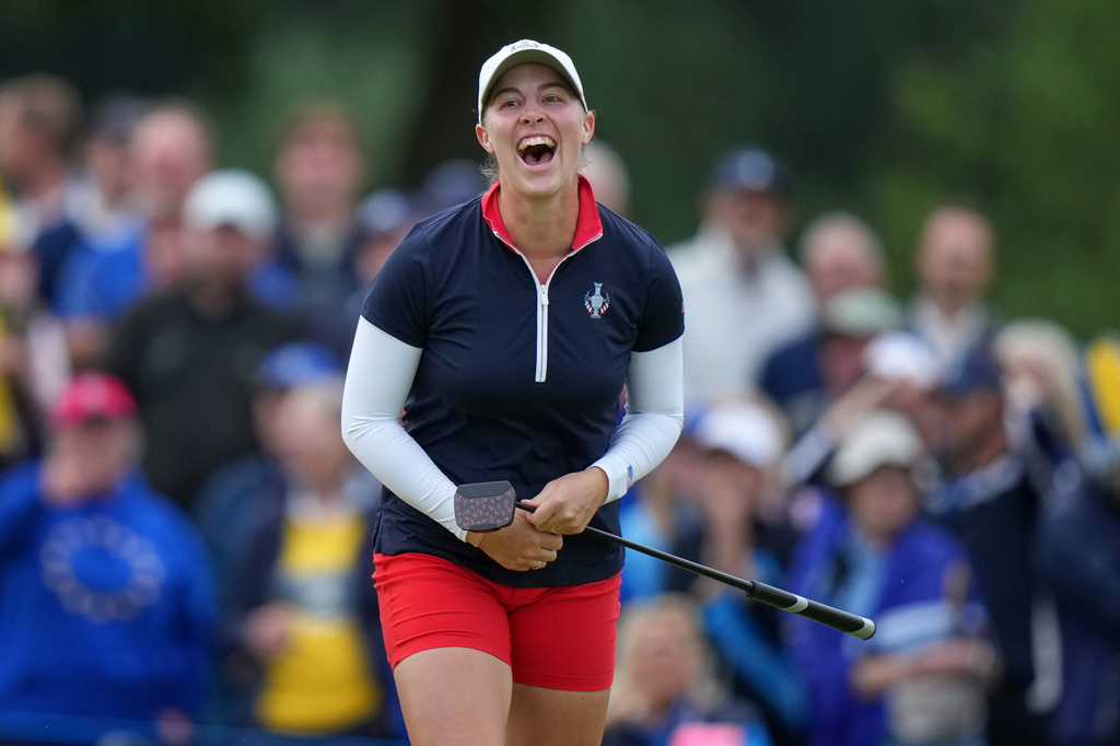 Jennifer Kupcho of the United States celebrates after holing a putt on the 17th green during the Solheim Cup in Den Bosch, Netherlands, Saturday, Sept. 12, 2026. (AP Photo/Alastair Grant)
