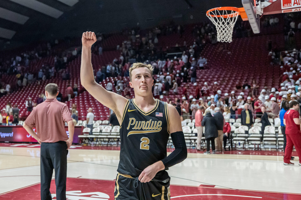 Purdue guard Fletcher Loyer (2) celebrates after a win over Alabama in an NCAA college basketball game, Thursday, Nov. 13, 2025, in Tuscaloosa, Ala. (AP Photo/Vasha Hunt)