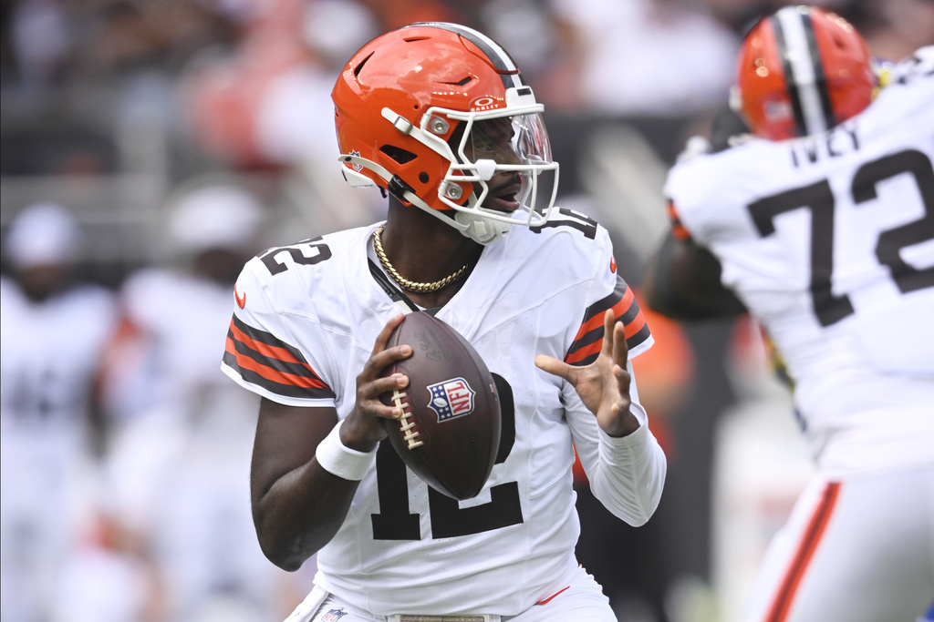 Cleveland Browns quarterback Shedeur Sanders (12) looks to pass against the Los Angeles Rams in the second half of an NFL preseason football game Saturday, Aug. 23, 2025, in Cleveland. (AP Photo/David Richard)