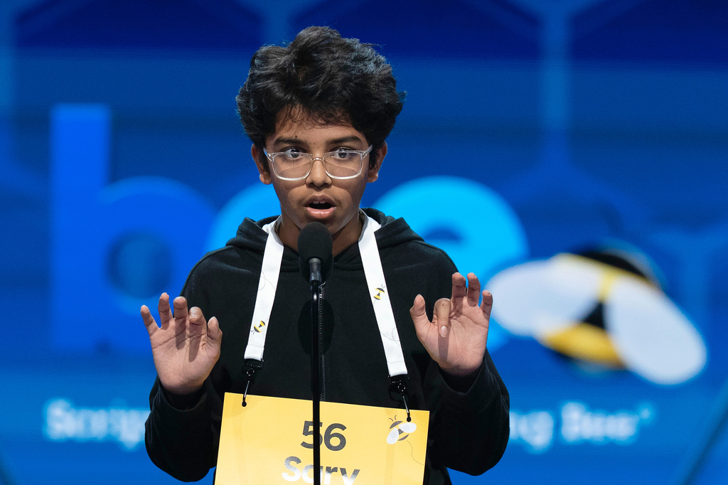 Sarv Dharavane, 12, Dunwoody, Ga., spells his word during the quarterfinals of the Scripps National Spelling Bee at DAR Constitution Hall, Wednesday, May 27, 2026, in Washington. (AP Photo/Jose Luis Magana)
