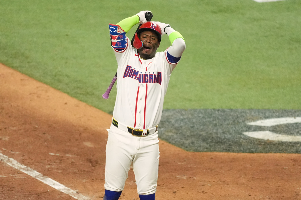 Dominican Republic Geraldo Perdomo reacts after striking out at the end of the ninth inning of a World Baseball Classic semifinal game against the United States, Sunday, March 15, 2026, in Miami. (AP Photo/Rebecca Blackwell)