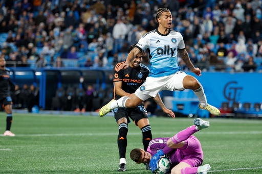 Charlotte FC forward Idan Toklomati leaps over New York City FC goalkeeper Matt Freese (49) as Freese blocks Toklomati's shot during the second half of Game 1 in the first round of MLS soccer's Eastern Conference playoffs in Charlotte, N.C., Tuesday, Oct. 28, 2025. (AP Photo/Nell Redmond) Charlotte FC forward Idan Toklomati leaps over New York City FC goalkeeper Matt Freese (49) as Freese blocks Toklomati's shot during the second half of Game 1 in the first round of MLS soccer's Eastern Conference playoffs in Charlotte, N.C., Tuesday, Oct. 28, 2025. (AP Photo/Nell Redmond)