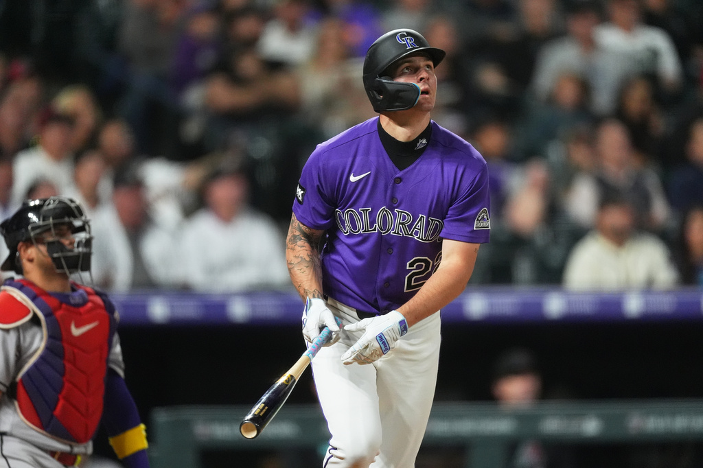 Colorado Rockies' Mickey Moniak heads up the first-base line after connecting for a solo home run off Colorado Rockies starting pitcher Kyle Freeland in the third inning of a baseball game Tuesday, Sept. 22, 2026, in Denver. (AP Photo/David Zalubowski)