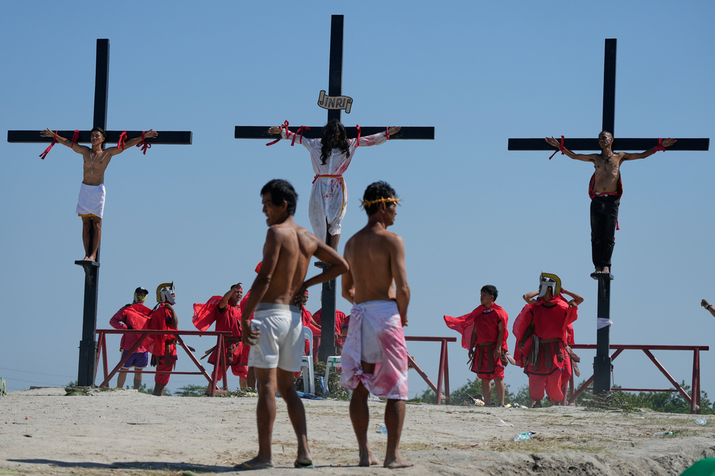 A reenactment of Jesus Christ's sufferings as part of Good Friday rituals in the San Pedro Cutud village, Pampanga province, northern Philippines, Friday April 3, 2026. (AP Photo/Aaron Favila)