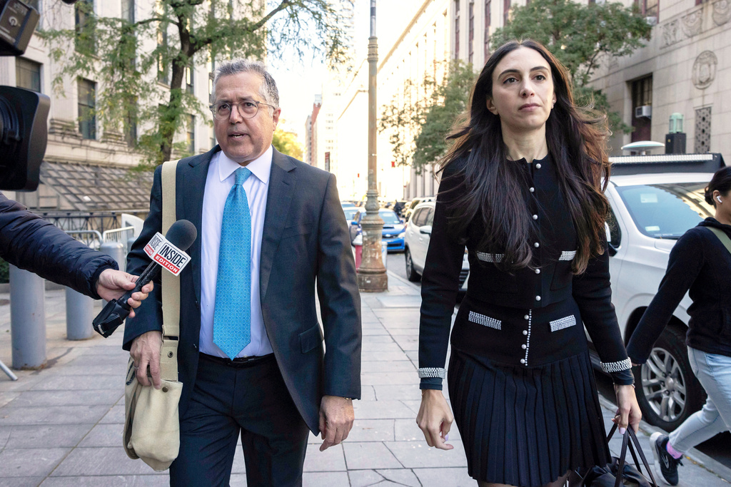 FILE - Attorney Marc Agnifilo, left, and Teny Geragos, right, for Sean "Diddy Combs, arrive at Manhattan federal court, Oct. 10, 2024, in New York. (AP Photo/Yuki Iwamura, File)