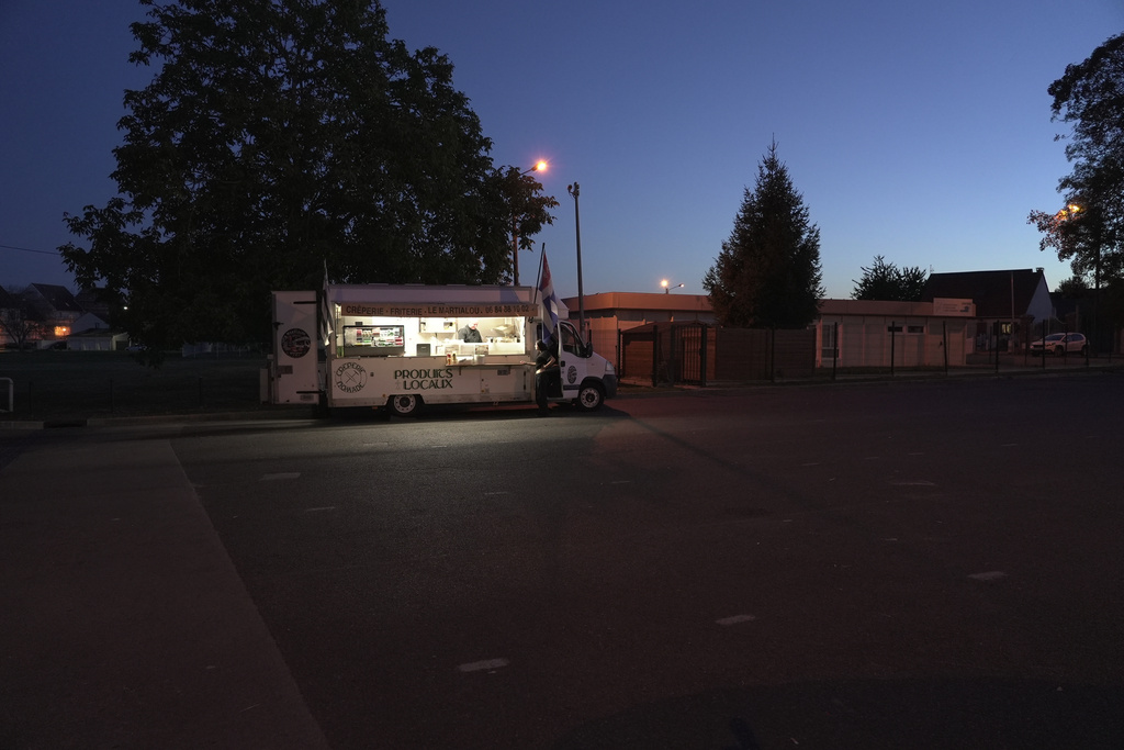 Martial Realland's food truck in Saint-Just-en-Chaussee, France, Wednesday Sept. 23, 2026. (AP Photo/John Leicester)