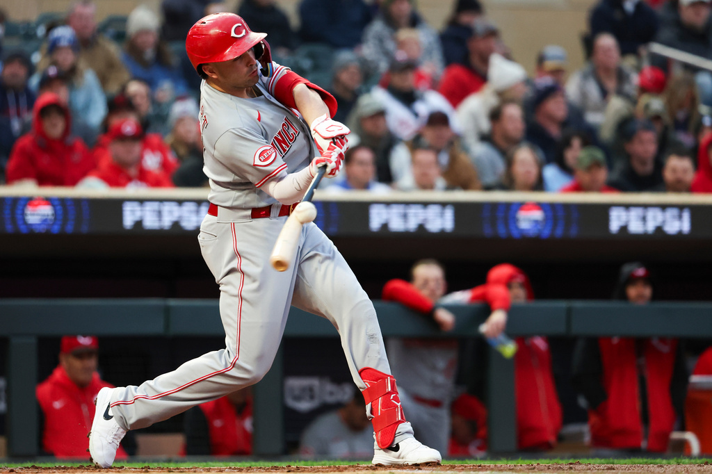 Cincinnati Reds third baseman Sal Stewart bats against the Minnesota Twins during the first inning of a baseball game Friday, April 17, 2026, in Minneapolis. (AP Photo/Ellen Schmidt)