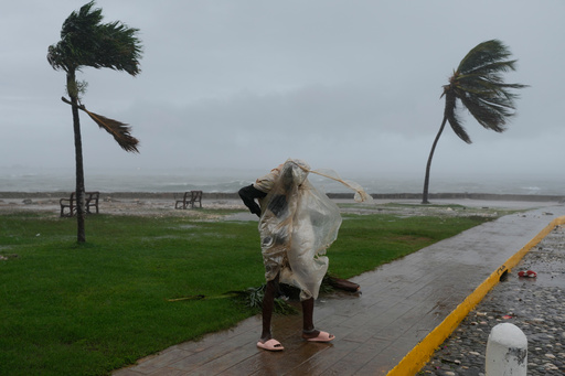A man walks in Kingston, Jamaica, as Hurricane Melissa approaches, Tuesday, Oct. 28, 2025. (AP Photo/Matias Delacroix) A man walks in Kingston, Jamaica, as Hurricane Melissa approaches, Tuesday, Oct. 28, 2025. (AP Photo/Matias Delacroix)