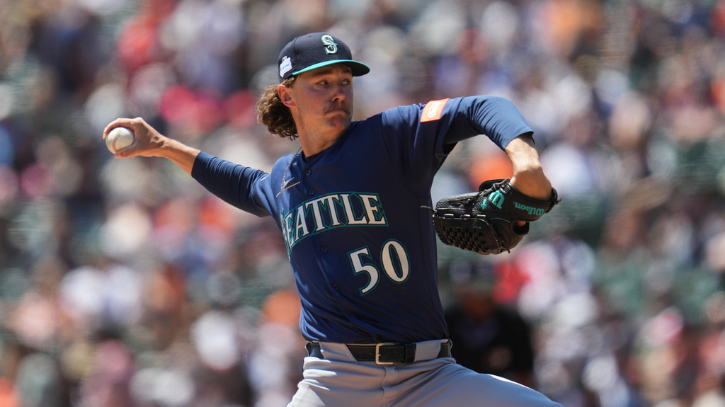 Seattle Mariners pitcher Bryce Miller throws against the Detroit Tigers during the first inning of a baseball game Saturday, June 6, 2026, in Detroit. (AP Photo/Paul Sancya)
