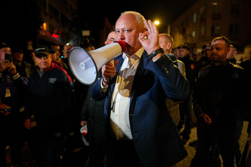 Former Moldovan President Igor Dodon, a member of the pro-Russian Patriotic Electoral Bloc, speaks to supporters protesting outside the Electoral Commission after the polls closed for the parliamentary election, in Chisinau, Moldova, Sunday, Sept. 28, 2025. (AP Photo/Vadim Ghirda) Former Moldovan President Igor Dodon, a member of the pro-Russian Patriotic Electoral Bloc, speaks to supporters protesting outside the Electoral Commission after the polls closed for the parliamentary election, in Chisinau, Moldova, Sunday, Sept. 28, 2025. (AP Photo/Vadim Ghirda)