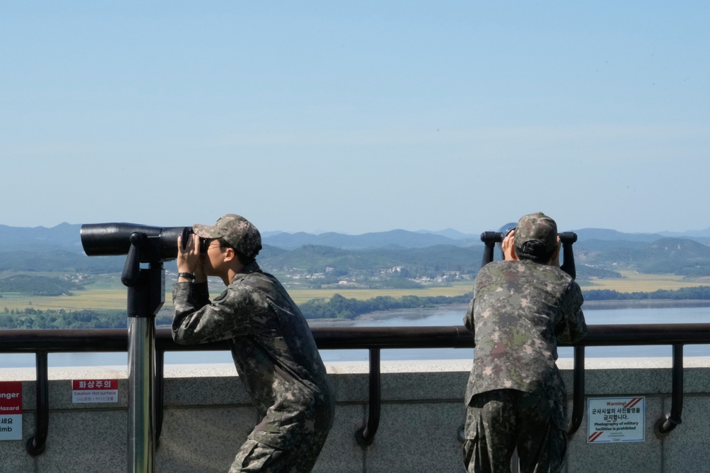 South Korean army soldiers watch the North Korean side from the Unification Observation Post in Paju, South Korea, near the border with North Korea, Wednesday, Sept. 16, 2026. (AP Photo/Ahn Young-joon)