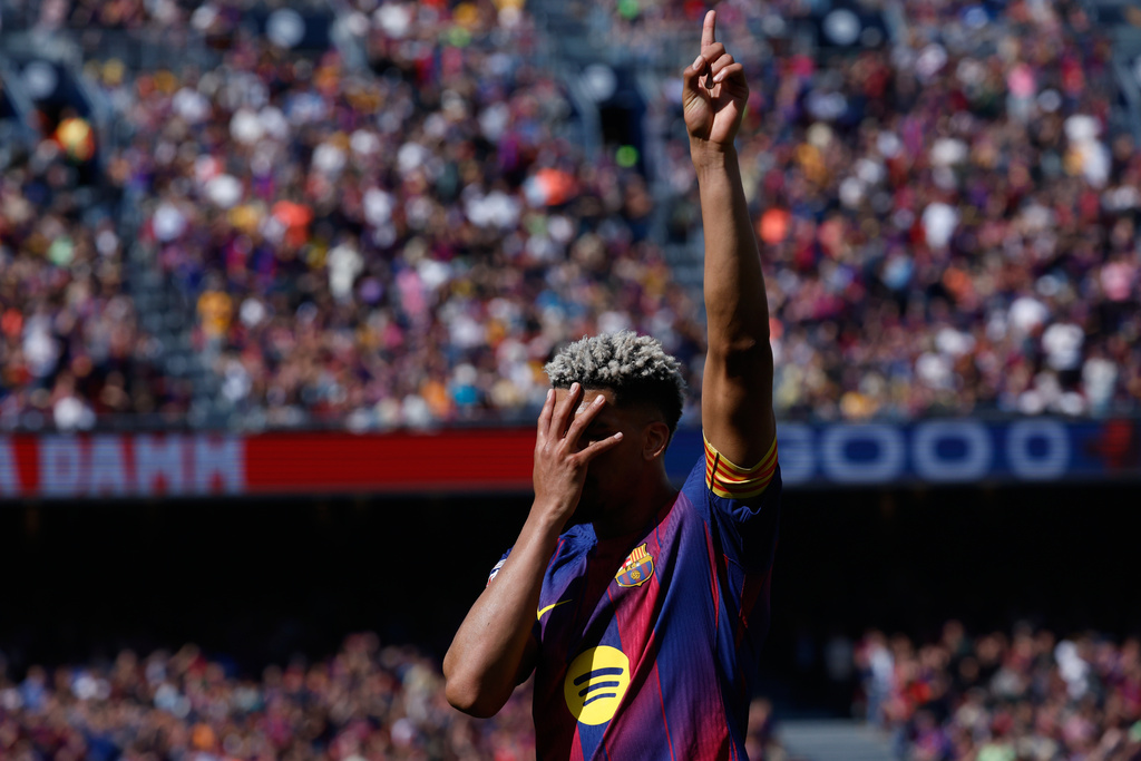 Barcelona edges Rayo Vallecano to increase pressure on Real Madrid ahead of capital derby