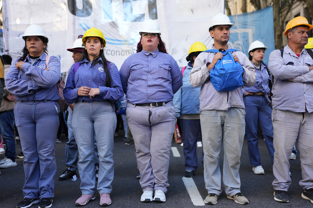 Laborers protest during a May Day demonstration in Buenos Aires, Argentina, Thursday, April 30, 2026. (AP Photo/Rodrigo Abd)