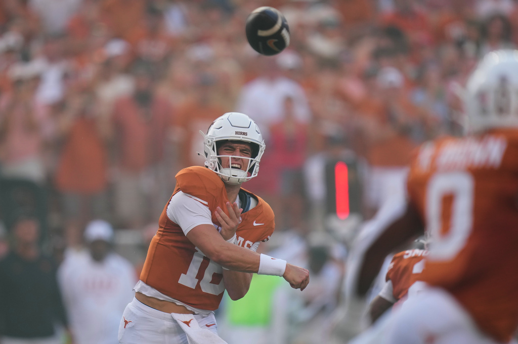 Texas quarterback Arch Manning (16) throws against Ohio State during the first half of an NCAA college football game in Austin, Texas, Saturday, Sept. 12, 2026. (AP Photo/Eric Gay)