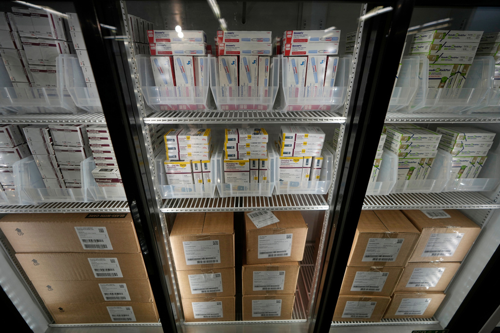FILE - Packets of insulin vials and pens are warehoused at a Kaiser warehouse in Downey, Calif., March 18, 2023. (AP Photo/Damian Dovarganes, file)