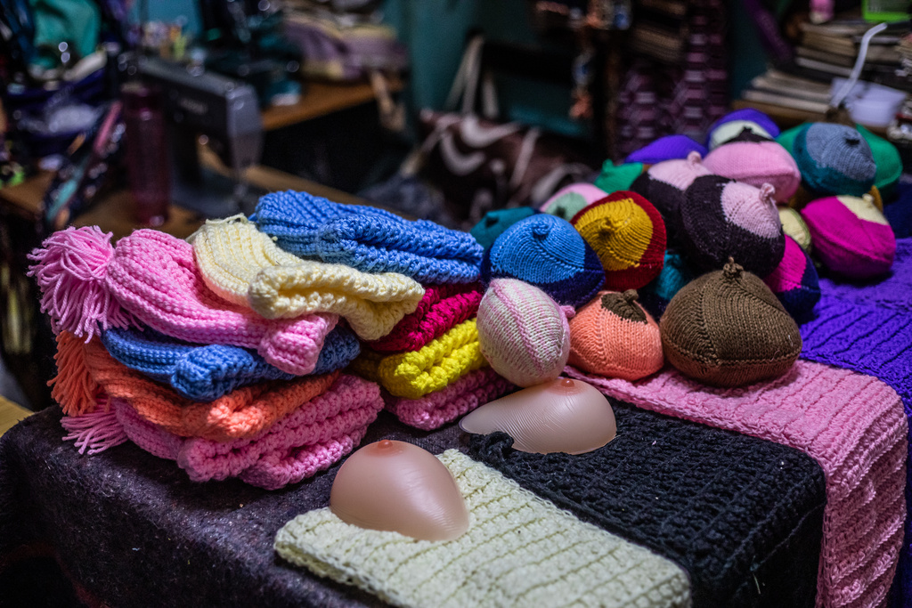 Knitted breast prosthesis are displayed on a table in Thika, Kiambu County, Kenya, Friday, Jan. 30, 2026. (AP Photo/Samson Otieno)