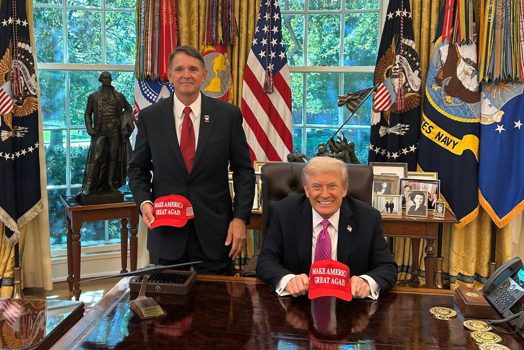 Ed Gallrein, left, poses for a photo with President Donald Trump in the Oval Office, Oct. 2025, in Washington. (Gallrein Campaign via AP)