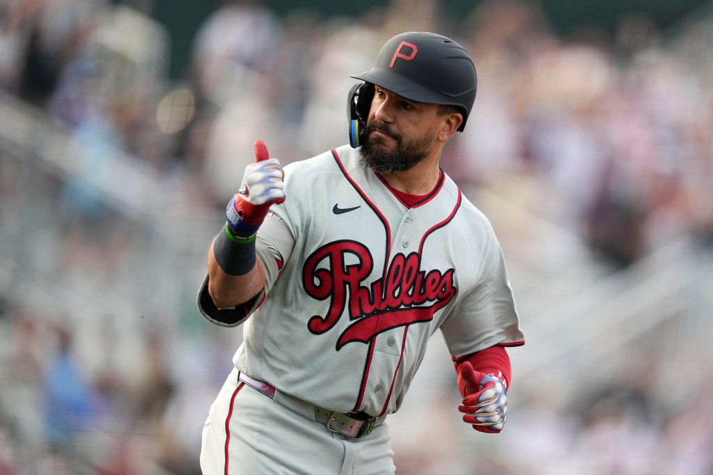 Philadelphia Phillies designated hitter Kyle Schwarber reacts after hitting a home run during the first inning of a baseball game against the Minnesota Twins at the Field of Dreams movie site, Thursday, Aug. 13, 2026, in Dyersville, Iowa. (AP Photo/Charlie Neibergall)