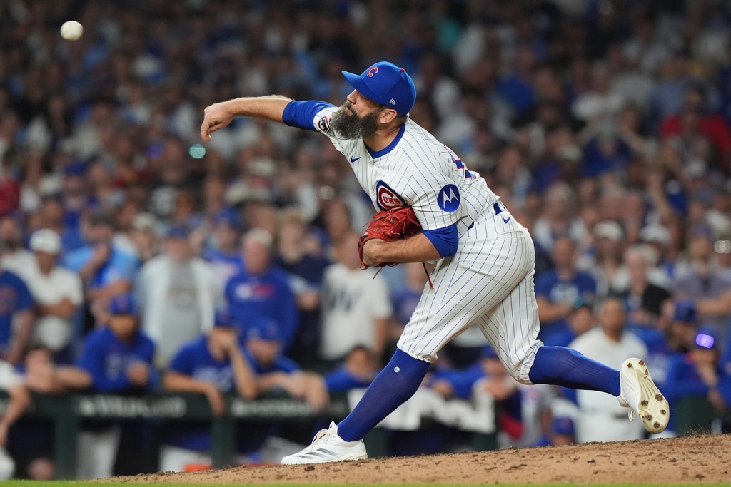 Chicago Cubs' Andrew Kittredge throws during the ninth inning of Game 3 of a National League wild card baseball game against the San Diego Padres Thursday, Oct. 2, 2025, in Chicago. (AP Photo/Nam Huh)