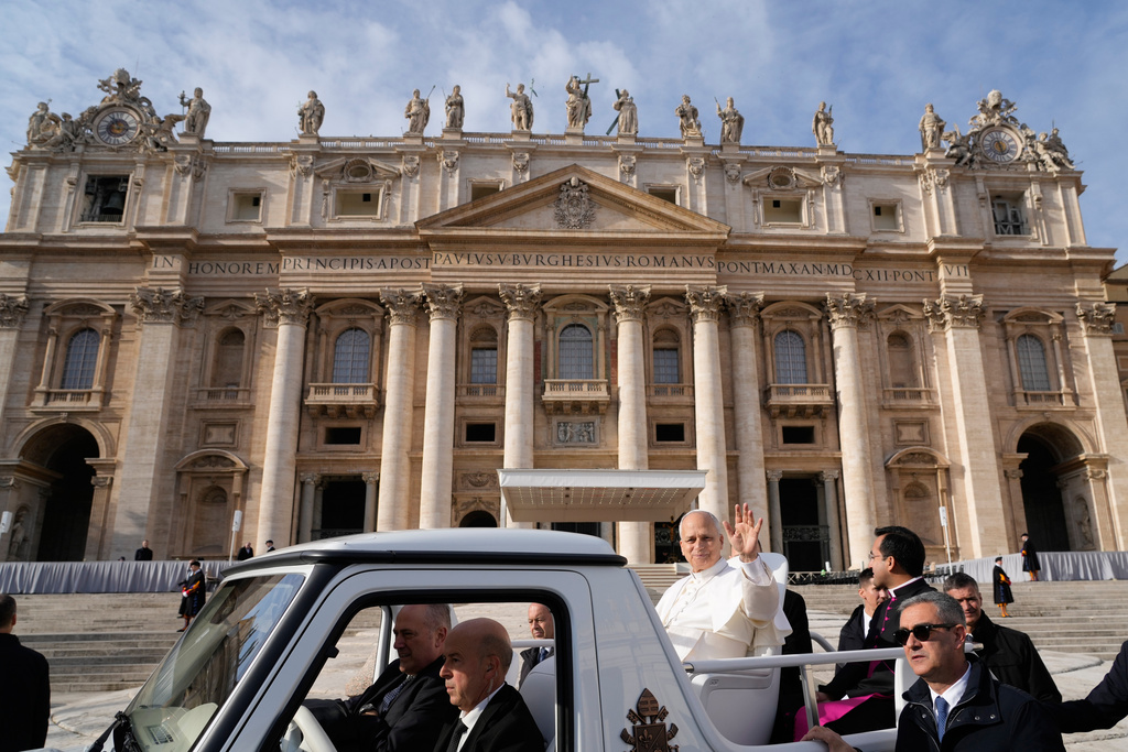 Pope Leo XIV leaves St. Peter's Square at the end of the last Jubilee audience, at the Vatican, Saturday, Dec. 20, 2025. (AP Photo/Gregorio Borgia)