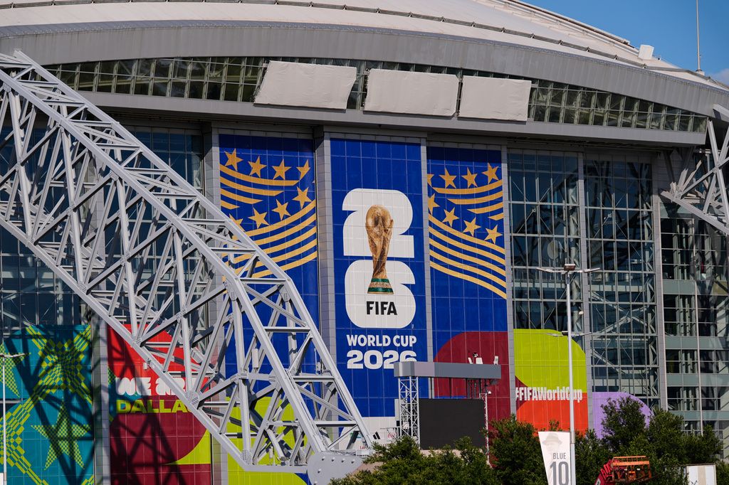 AT&T Stadium, where upcoming World Cup soccer matches are scheduled to be played, has its name covered by three gray tarps Monday, June 1, 2026, in Arlington, Texas. (AP Photo/Tony Gutierrez)