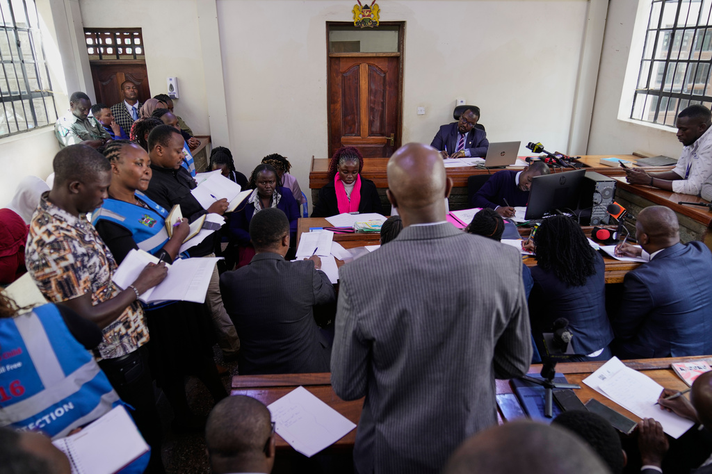 Court proceedings take place as nine students from Utumishi Girls Academy, not seen, appear at Naivasha Law Courts in Nakuru, Kenya, Tuesday, June 2, 2026. (AP Photo/Brian Inganga)