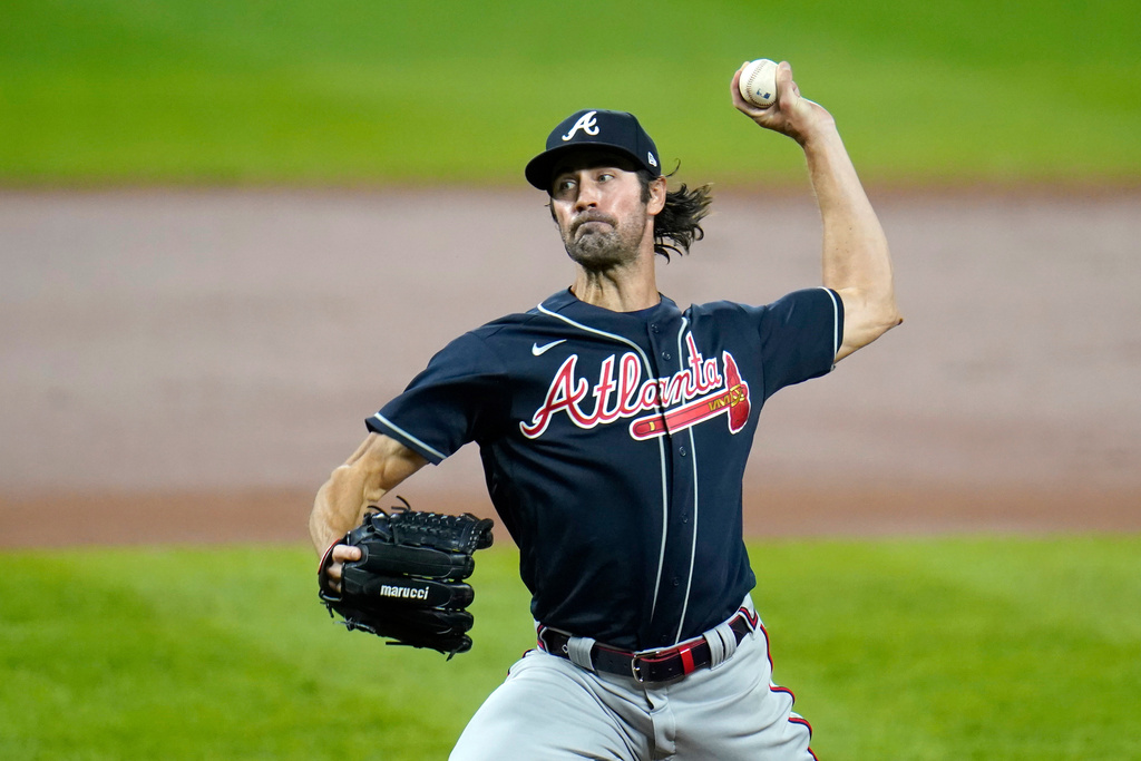 FILE - Atlanta Braves starting pitcher Cole Hamels throws a pitch to the Baltimore Orioles during the second inning of a baseball game, Sept. 16, 2020, in Baltimore. (AP Photo/Julio Cortez, File)