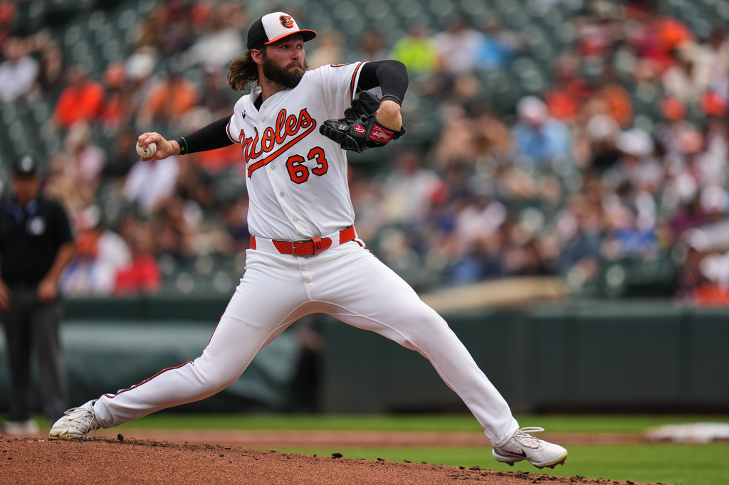 Baltimore Orioles starting pitcher Brandon Young (63) delivers during the second inning of a baseball game against the Los Angeles Angels, Thursday, Aug. 6, 2026, in Baltimore. (AP Photo/Stephanie Scarbrough)