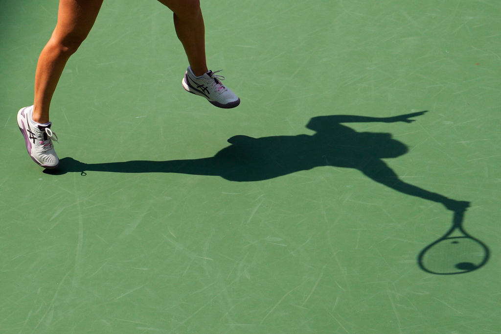Jasmine Paolini, of Italy, returns the ball to Veronika Erjavec, of Slovenia, during the first round of the U.S. Open tennis championships Sunday, Aug. 30, 2026, in New York. (AP Photo/Yuki Iwamura)