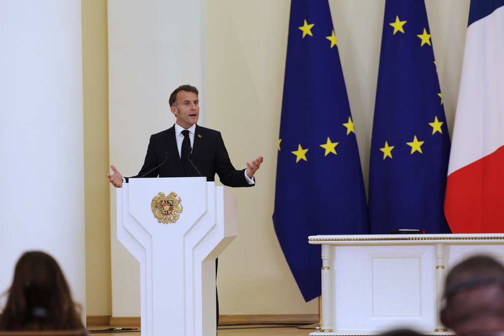 French President Emmanuel Macron addresses a media conference during the EU-Armenia summit at the Presidential Palace in Yerevan, Armenia, Tuesday, May 5, 2026. (AP Photo/Anthony Pizzoferrato)