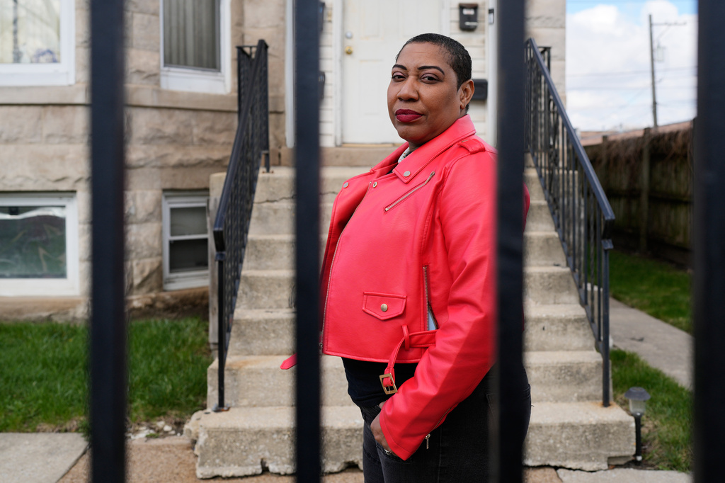 Asiaha Butler, the co-founder of the Resident Association of Greater Englewood, poses for a photo outside her office in Chicago, Monday, April 6, 2026. (AP Photo/Nam Y. Huh)