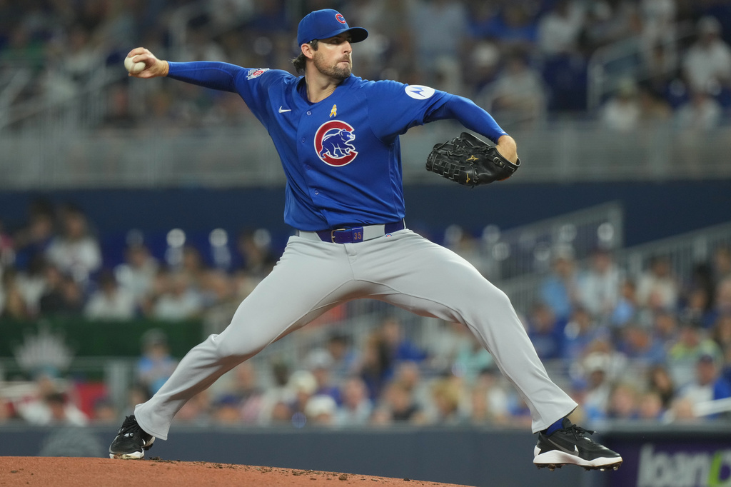 Chicago Cubs starting pitcher Clay Holmes aims a pitch during the first inning of a baseball game against the Miami Marlins Sunday, Sept. 6, 2026, in Miami. (AP Photo/Marta Lavandier)