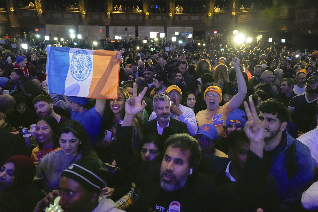 Supporters for Democratic mayoral candidate Zohran Mamdani react as they watch returns during an election night watch party, Tuesday, Nov. 4, 2025, in New York. (AP Photo/Yuki Iwamura)