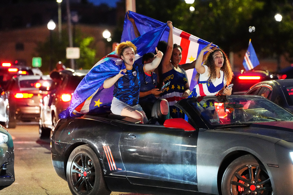Cape Verde supporters celebrate in cars on the streets after the World Cup Group H soccer match between Uruguay and Cape Verde at the Cape Verde community in Brockton, Mass. near Boston, Sunday, June 21, 2026. (AP Photo/Martin Meissner)