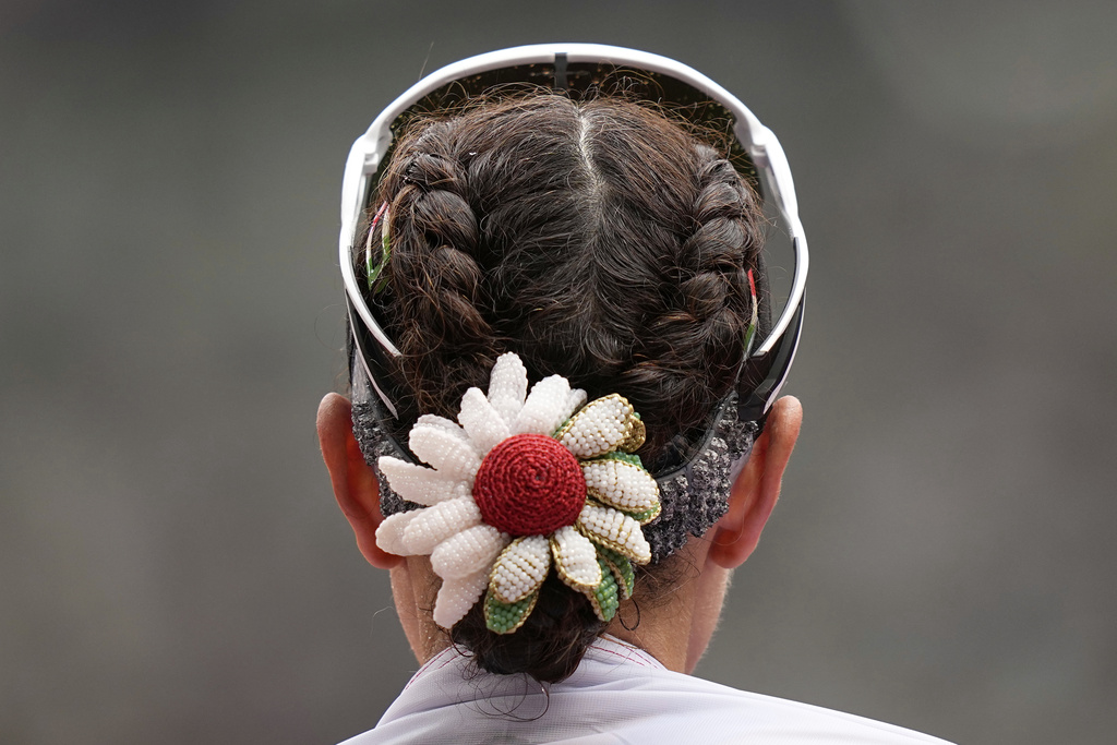 Italy's Antonella Palmisano, who took the silver medal, stands on the track after the the women's 35 kilometers race walk at the World Athletics Championships in Tokyo, Saturday, Sept. 13, 2025. (AP Photo/Petr David Josek)