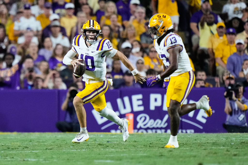 LSU quarterback Sam Leavitt (10) carries against Texas A&amp;M in the first half of an NCAA college football game against LSU, Saturday, Sept. 26, 2026 in Baton Rouge, La. (AP Photo/Gerald Herbert)