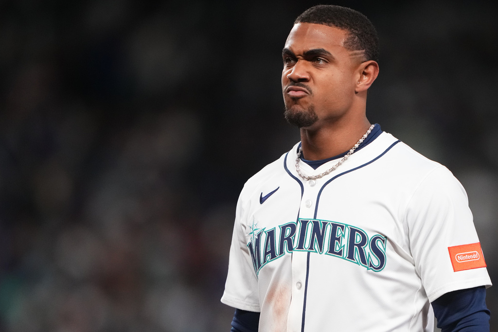 Seattle Mariners' Julio Rodriguez reacts after the team's loss in Game 1 of baseball's American League Division Series against the Detroit Tigers, Saturday, Oct. 4, 2025, in Seattle. (AP Photo/Lindsey Wasson)