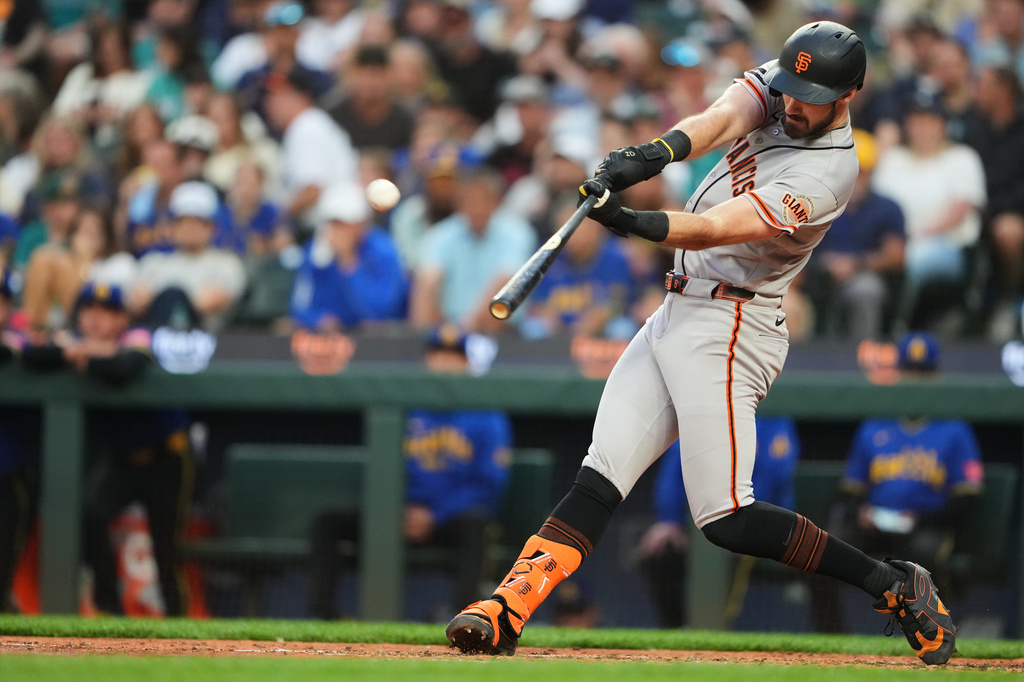 San Francisco Giants' Bryce Eldridge hits a two-run home run against the Seattle Mariners during the fifth inning of a baseball game, Friday, July 17, 2026, in Seattle. (AP Photo/Lindsey Wasson)
