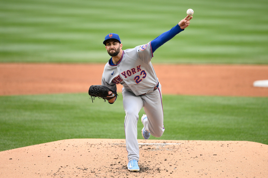 New York Mets pitcher David Peterson throws during the second inning of a baseball game against the Washington Nationals, Thursday, May 21, 2026, in Washington. (AP Photo/Nick Wass)