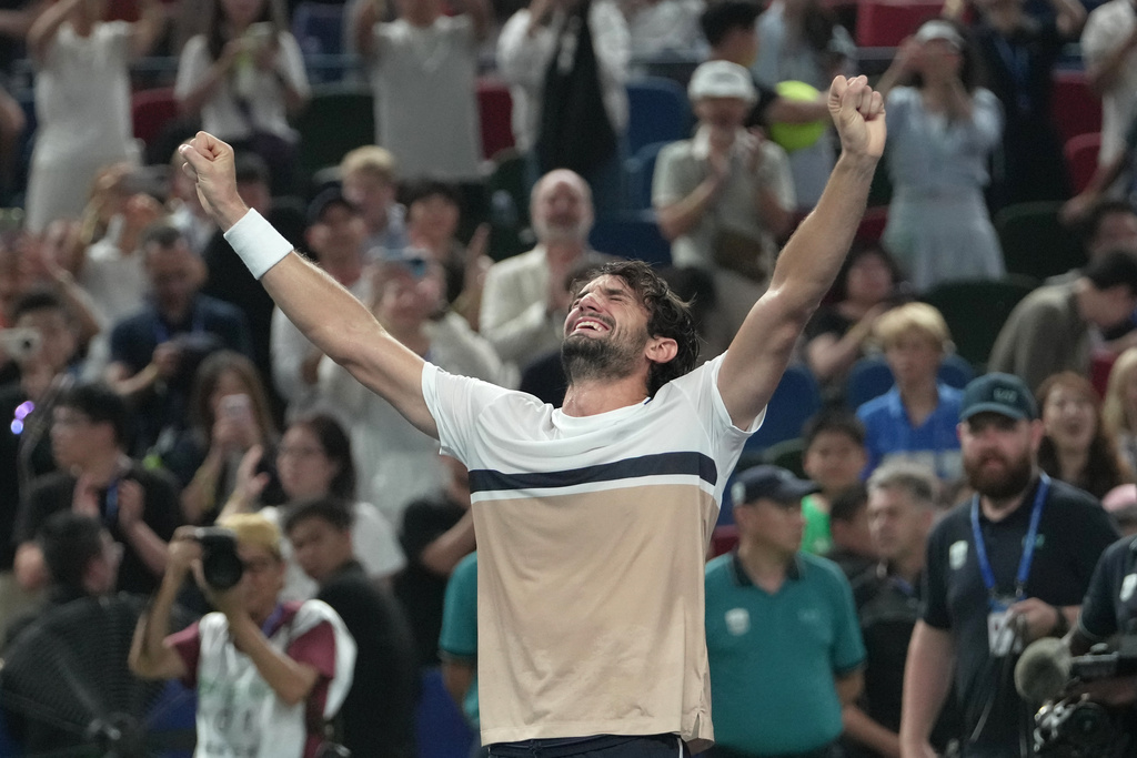 Valentin Vacherot of Monaco celebrates after winning the final of the Shanghai Masters tennis tournament, defeating Arthur Rinderknech of France at Qizhong Forest Sports City Tennis Center, in Shanghai, China, Sunday, Oct. 12, 2025. (AP Photo/Andy Wong)