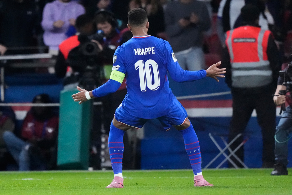 France's Kylian Mbappe celebrates after scoring during a World Cup 2026 Group D qualifying soccer match between France and Azerbaijan in Paris, France, on Friday, Oct. 10, 2025. (AP Photo/Michel Euler)