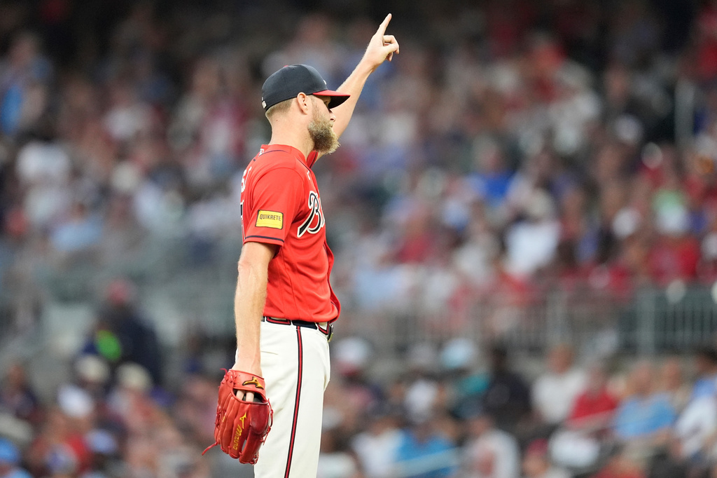 Atlanta Braves pitcher Chris Sale (51) waves to the crowd after pitching 2,700 lifetime stikeouts in the fifth inning of a baseball game against the Texas Rangers, Friday, July 17, 2026, in Atlanta. (AP Photo/Mike Stewart)