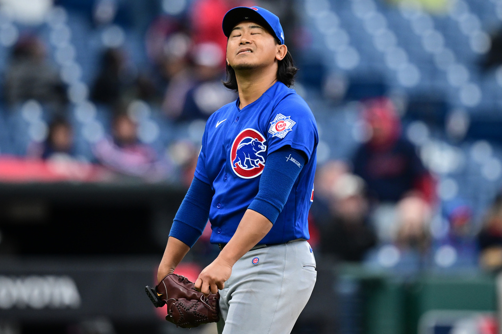 Chicago Cubs starting pitcher Shota Imanaga reacts before being removed from the game by manager Craig Counsell in the sixth inning in the second baseball game of a doubleheader against the Cleveland Guardians, Sunday, April 5, 2026, in Cleveland. (AP Photo/David Dermer)