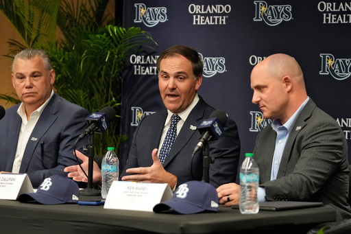 New Tampa Bay Rays ownership managing partner and co-chair Patrick Zalupski, center, answers a question, as co-chair Bill Cosgrove, left, and chief executive officer Ken Babby, right, look on during an introductory baseball news conference, Tuesday, Oct. 7, 2025, in Tampa, Fla. (AP Photo/Chris O'Meara) New Tampa Bay Rays ownership managing partner and co-chair Patrick Zalupski, center, answers a question, as co-chair Bill Cosgrove, left, and chief executive officer Ken Babby, right, look on during an introductory baseball news conference, Tuesday, Oct. 7, 2025, in Tampa, Fla. (AP Photo/Chris O'Meara)