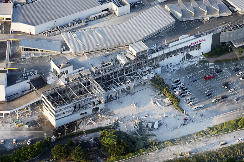 This aerial image shows the damaged AEON Mall following an earthquake in Kashima, Kumamoto prefecture, southern Japan, Tuesday, July 28, 2026. (Kyodo News via AP)