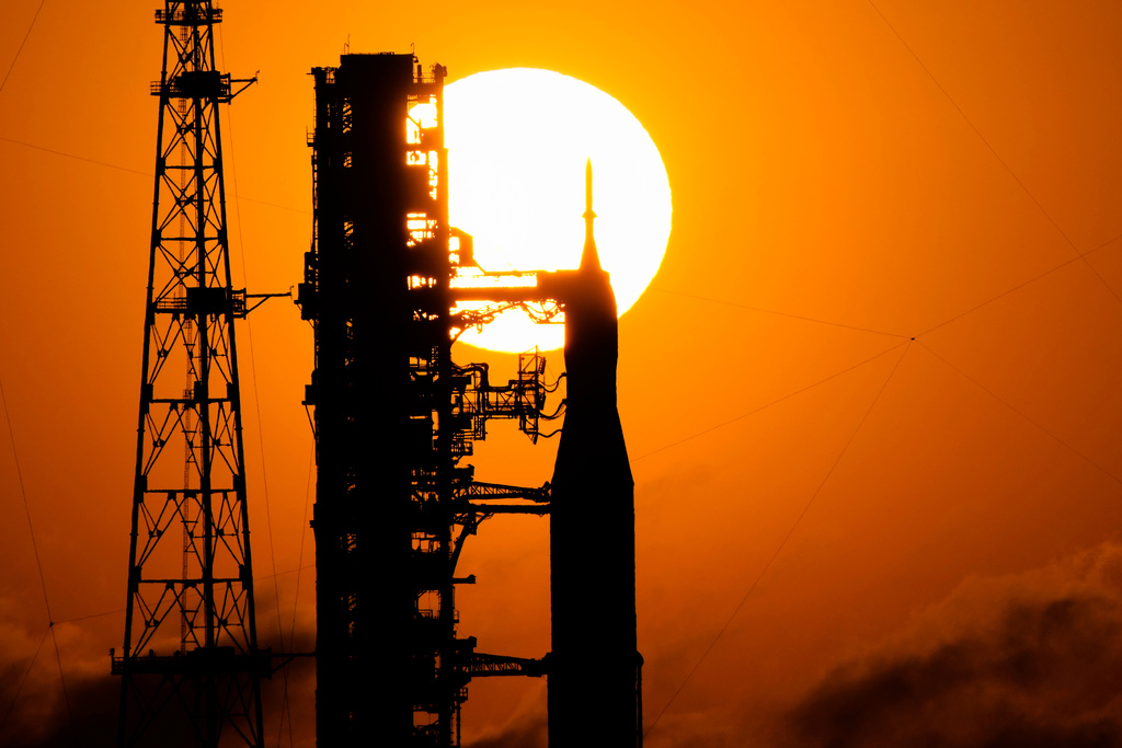 NASA's Space Launch System rocket with the Orion spacecraft set for the Artemis 2 mission is seen on Launch Complex 39B at sunrise at the Kennedy Space Center, Tuesday, March 24, 2026, in Cape Canaveral, Fla. (AP Photo/John Raoux)