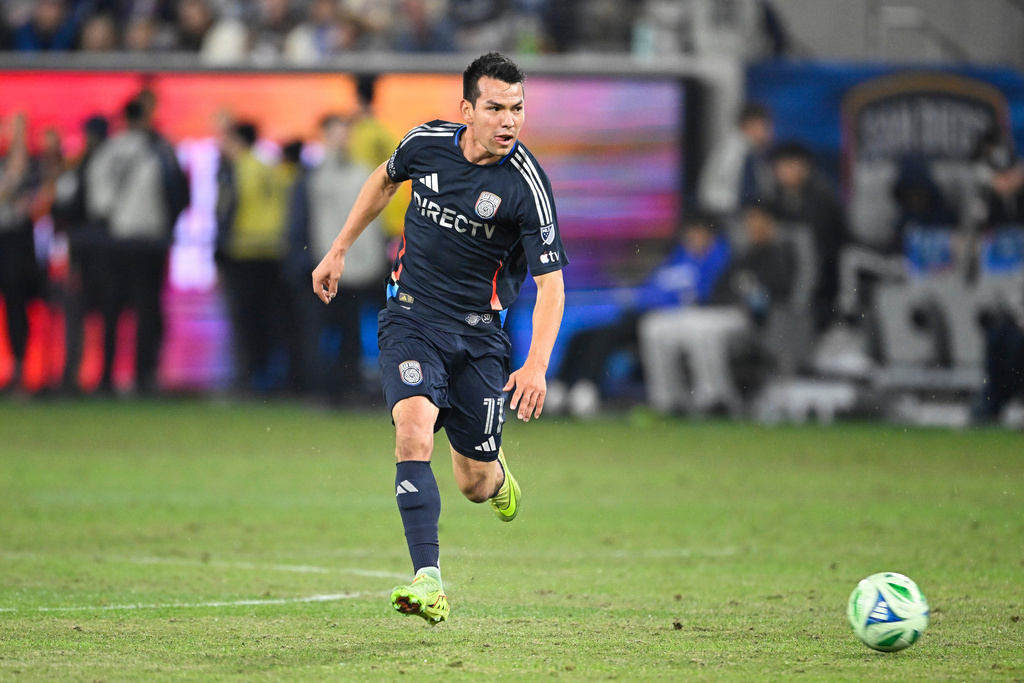 FILE - San Diego FC midfielder Hirving "Chucky" Lozano (11) plays during the second half of MLS soccer's Western Conference semifinal against Minnesota United Nov. 24, 2025, in San Diego. (AP Photo/Denis Poroy, File)