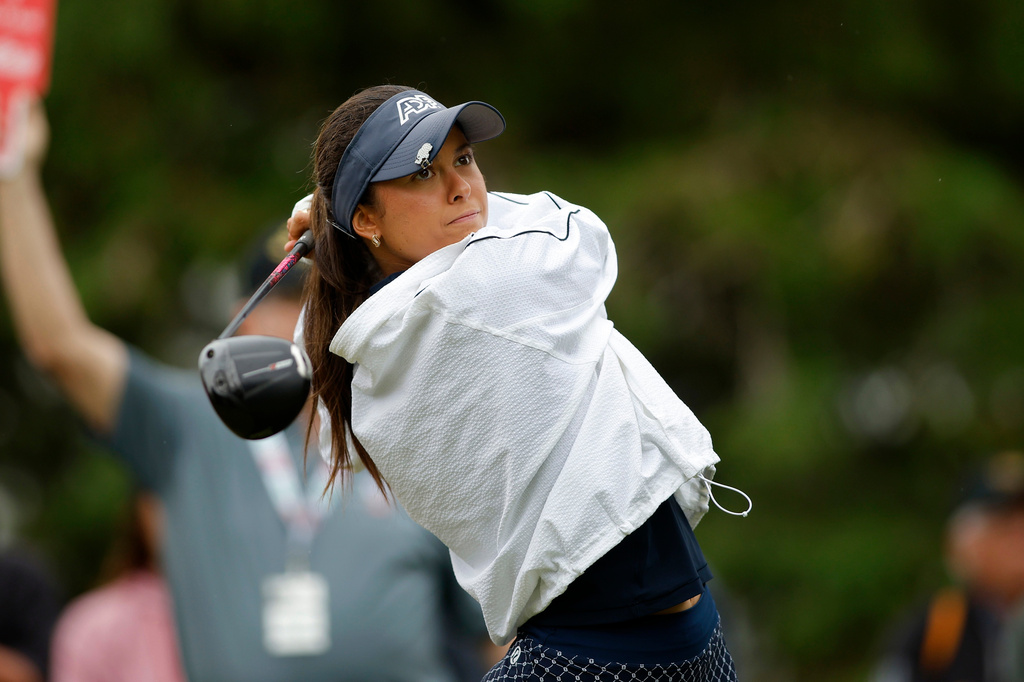 Yana Wilson watches her tee shot on the 10th hole during the final round of the Dow Championship LPGA golf tournament, Sunday, June 14, 2026, at Midland Country Club in Midland, Mich. (AP Photo/Al Goldis)