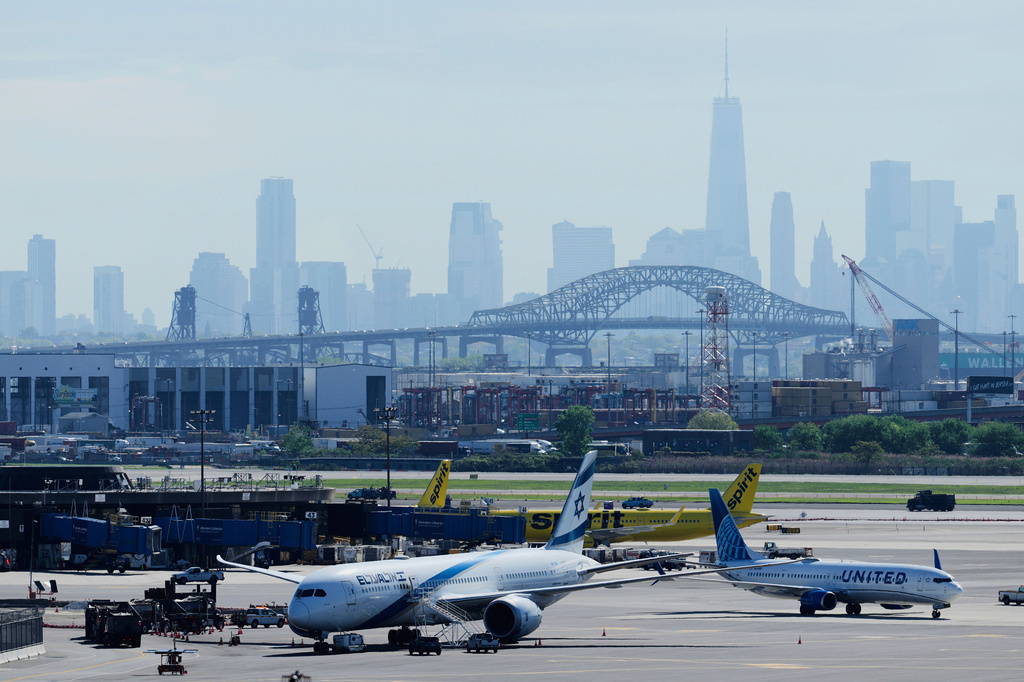 FILE - The New York City skyline is seen behind Newark Liberty International Airport in Newark, N.J., Wednesday, May 7, 2025. (AP Photo/Seth Wenig,File)